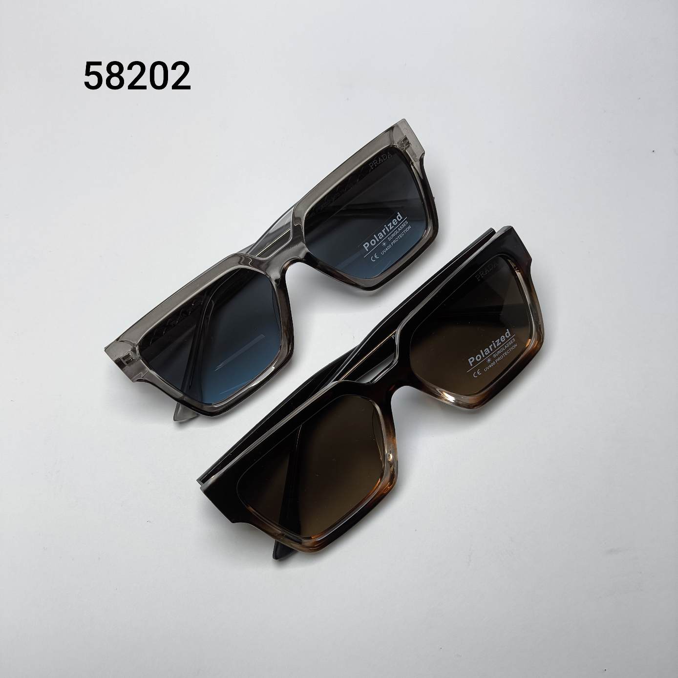 عینک آفتابی زنانه پلاریزه کائوچو دسته سیم پرادا Prada مدل 58202